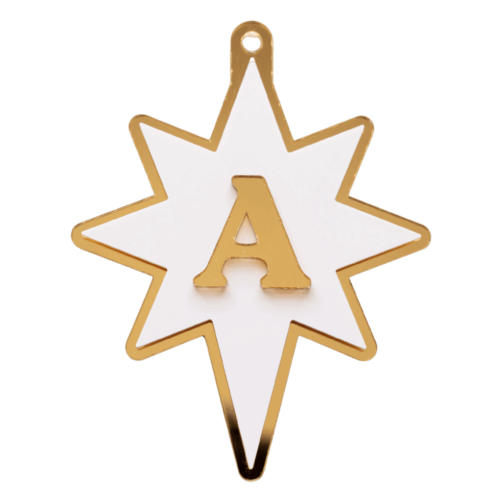 Laser cut acrylic star ornament with name initial on top by Made of Embers