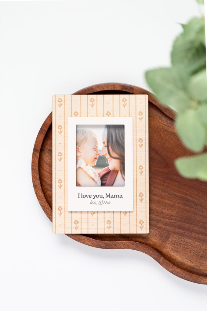 Laser cut wooden frame with engraved floral pattern in the background and a 3D border with engraved text for Mothers Day by Made of Embers